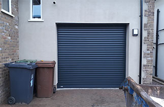A Sws Seceuroglide Excel insulated roller shutter garage door. Fitted in Camberley, Surrey.