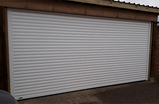 A Sws Seceuroglide Excel insulated roller shutter garage door. Fitted in Surrey.