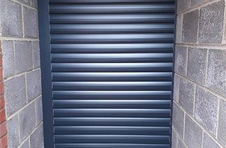 A Sws Seceuroglide Excel insulated roller shutter garage door. Fitted in Woodley, Berkshire.