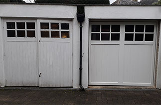 The door on the right hand side is a bespoke Woodriet Cedar wood up and over garage door. Fitted in Blackwater, Surrey.