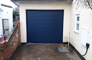 A Sws Seceuroglide Excel insulated roller shutter garage door. Fitted in Send, Surrey.