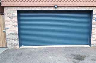 A Sws Seceuroglide Excel Insulated Roller Shutter Garage Door in Anthracite Grey. Fitted in Camberley, Surrey.