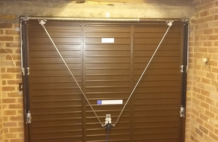Inside view of a Garador framed canopy garage door, fitted behind the structural opening