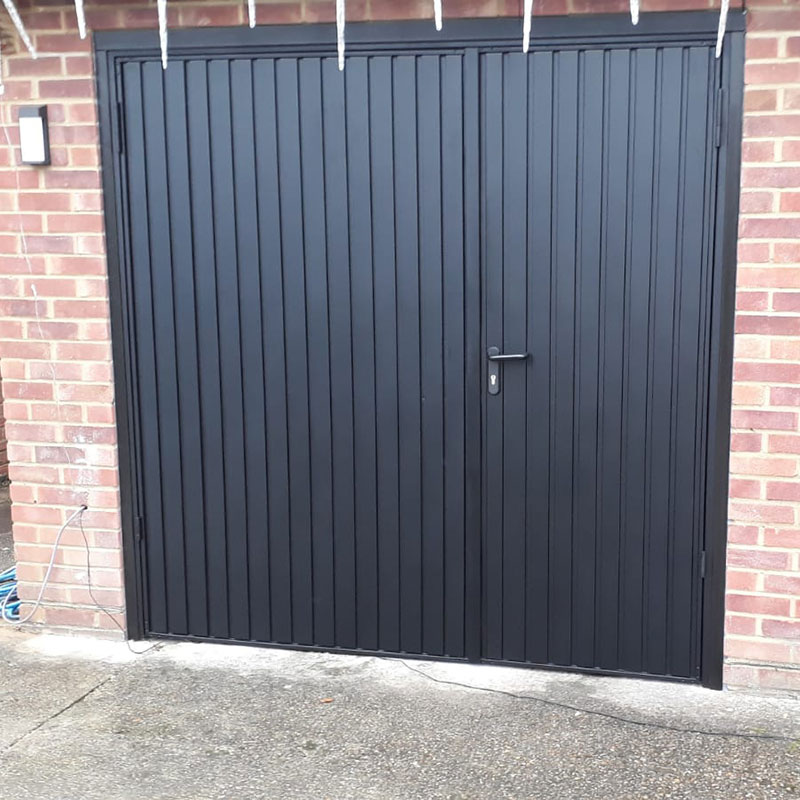 Side hinged garage doors installation gallery