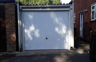 A Garador Carlton style up and over garage door. Fitted in Camberley. Surrey.