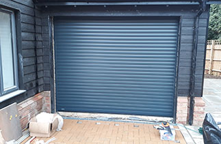 A Sws Seceuroglide Excel roller shutter garage door. In Anthracite Grey, Fitted in Banstead, Surrey.