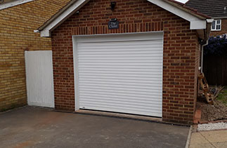 A White Sws Seceuroglide Excel roller shutter garage door. Fitted near Reading. Berkshire.