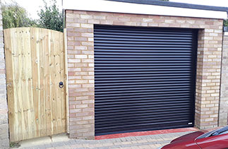 A Black Gliderol 55mm Compact Roller Shutter Garage Door fitted in Wokingham, Berkshire.