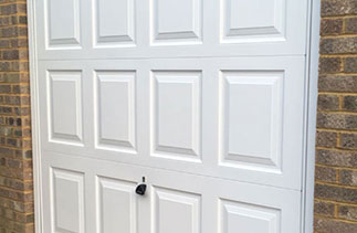 A Garador Georgian white frame canopy garage door