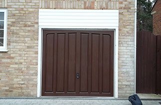 A 3 Crown GRP Elstead in Dark Oak fitted to the existing timber frame. Customer is having a new fascia installed and will be redecorating his existing timber frame.