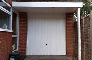 A Garador Carlton steel up and over garage door with a steel frame. Fitted in Camberley, Surrey.