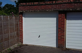A Garador Horizon on canopy gear fitted with a White steel frame. Door fitted in Blackwater, Surrey.