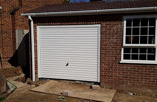 A Garador Horizon framed retractable plus garage door. Fitted in Maidenhead. Berkshire.