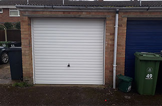 A Garador Horizon framed retractable plus garage door. Fitted in Mytchett, Surrey.