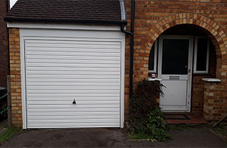 A Garador Horizon garage door with a new steel frame. Fitted in Woking, Surrey.