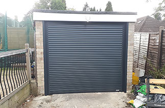 A Gliderol 55mm compact roller shutter garage door in Anthracite Grey. Fitted in Bagshot, Surrey.
