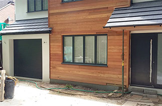 A Sws Seceuroglide Excel, insulated roller shutter garage door in Anthracite. Fitted in Woking, Surrey.