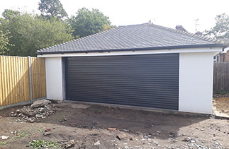 A Sws Securoglide Excel insulated roller shutter garage door. Fitted in Woking, Surrey.
