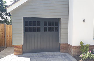 Two of Two GRP up and over garage door with a steel frame. Fitted in Windlesham, Surrey.