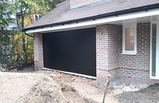 Two of Two Sws Seceuroglide Excel roller shutter garage doors fitted in Camberley, Surrey.
