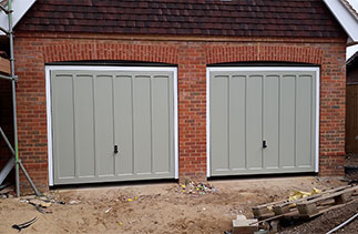 Two Woodrite Churchill timber doors in a colour match to Farrow and Ball French Grey. With White frames and White chassis. Doors fitted in Hampshire.